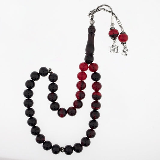 Red filtrate squeezing amber letter silver piece rosary
