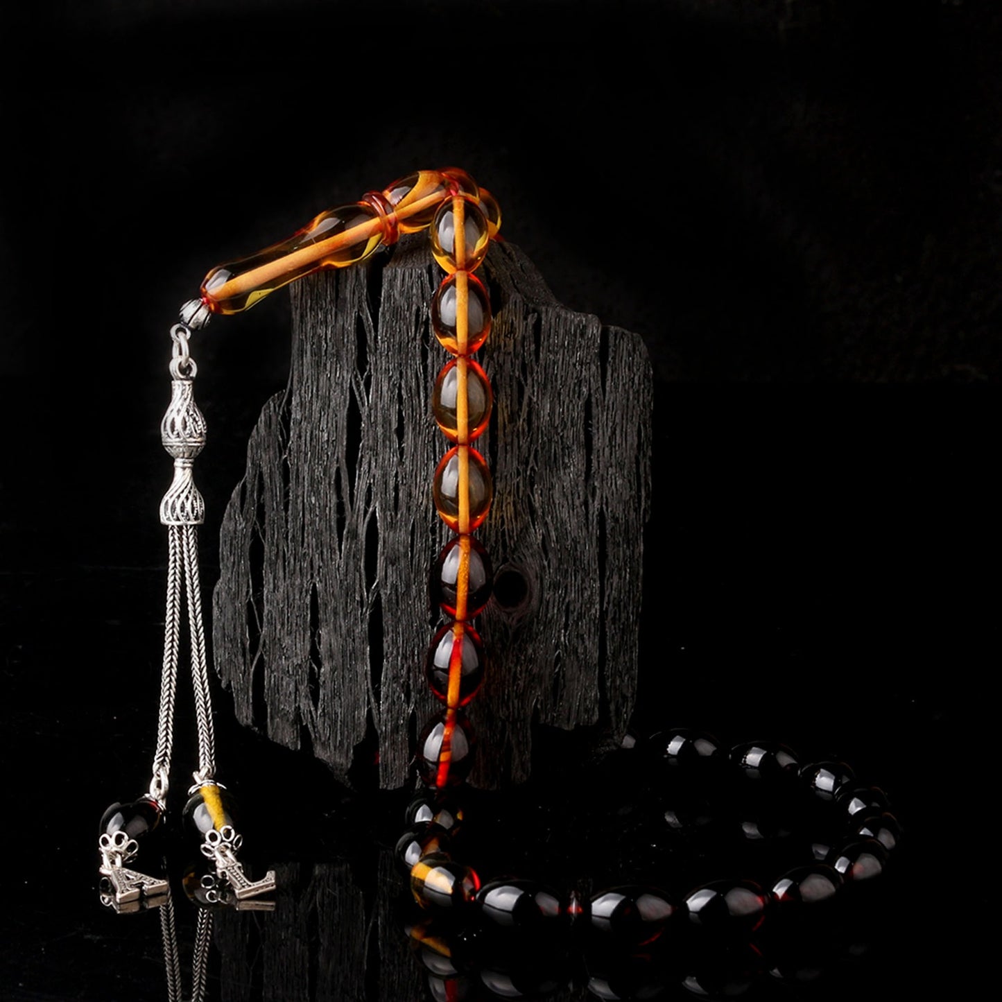 Strained squeezing amber letters silver fragmented rosary