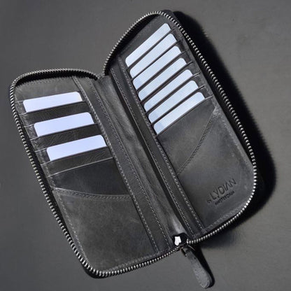 Portefeuille à fermeture éclair en cuir gris avec entrée de téléphone