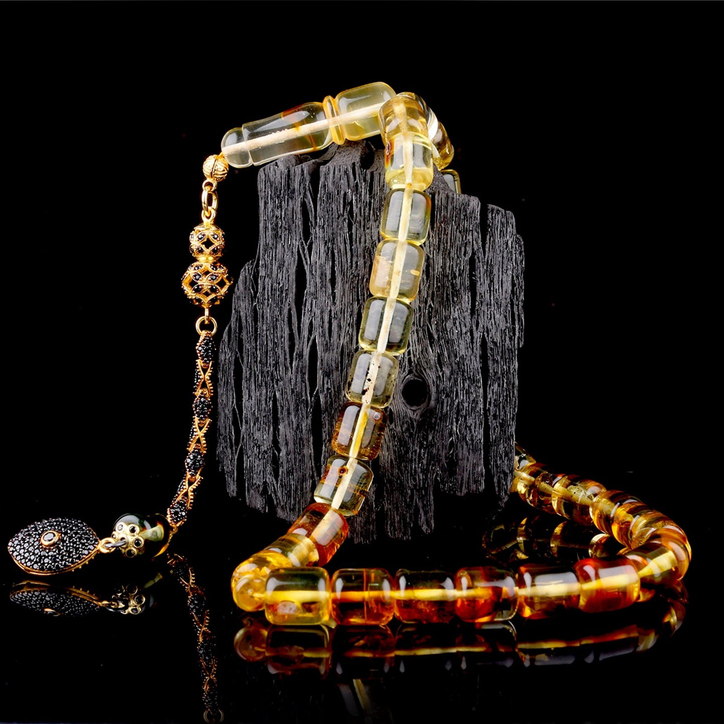 Kapsül Kesim Sarı-Siyah Damla Kehribar Tesbih