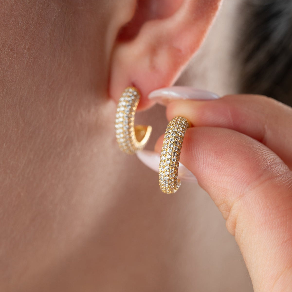 Half -ring earrings