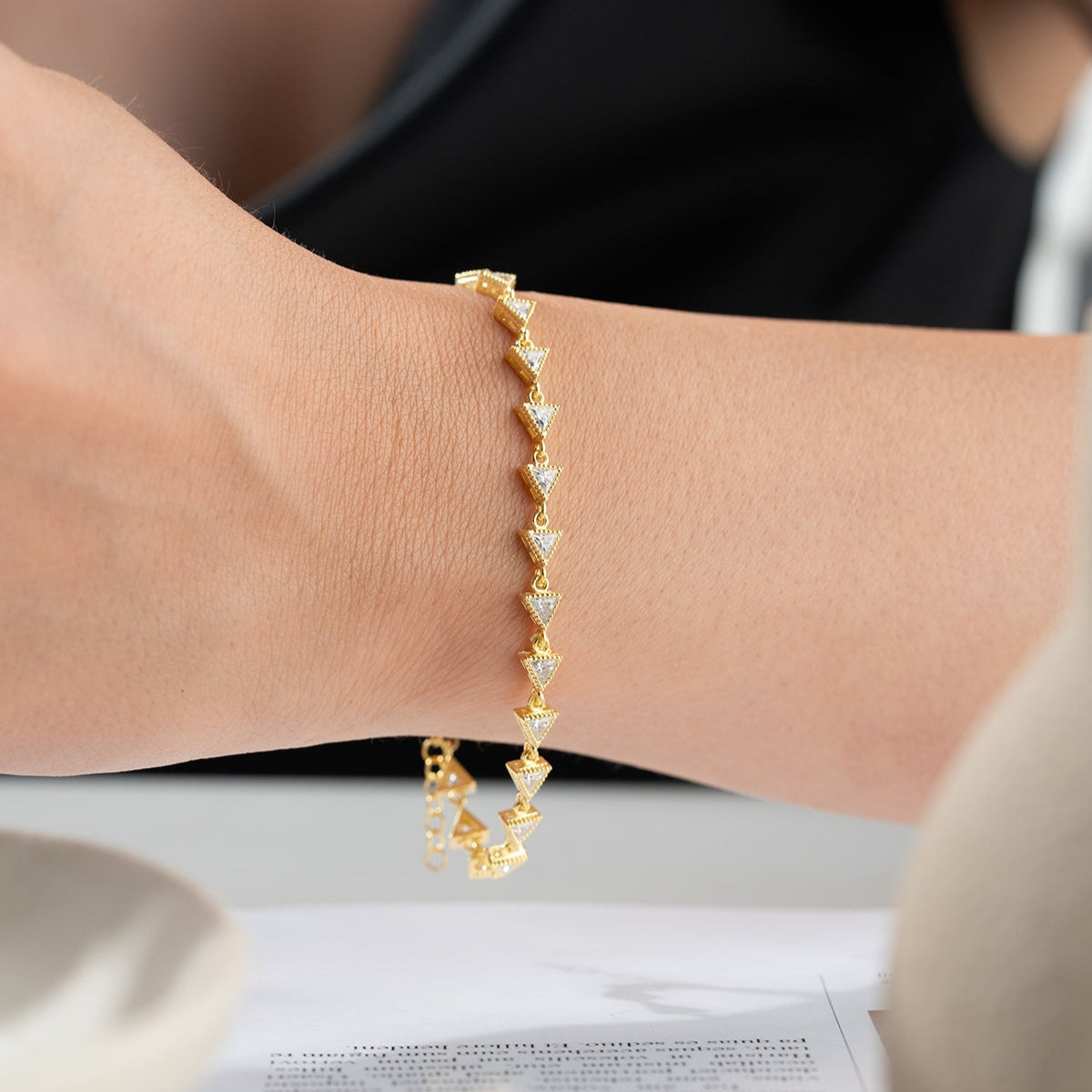 Triangular stone detail gold plated elegant bracelet