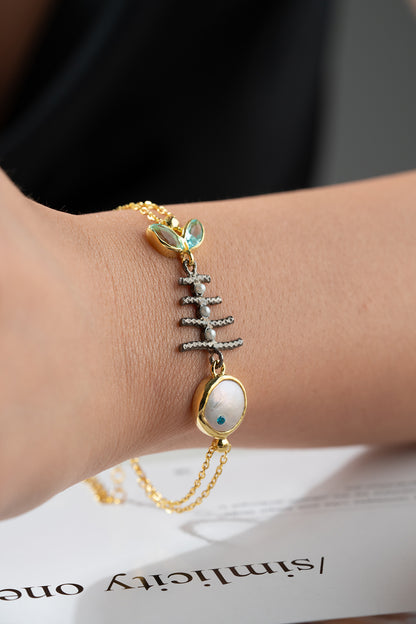 Armband aus 925er Silber mit Fischmotiv und Zirkonsteinen