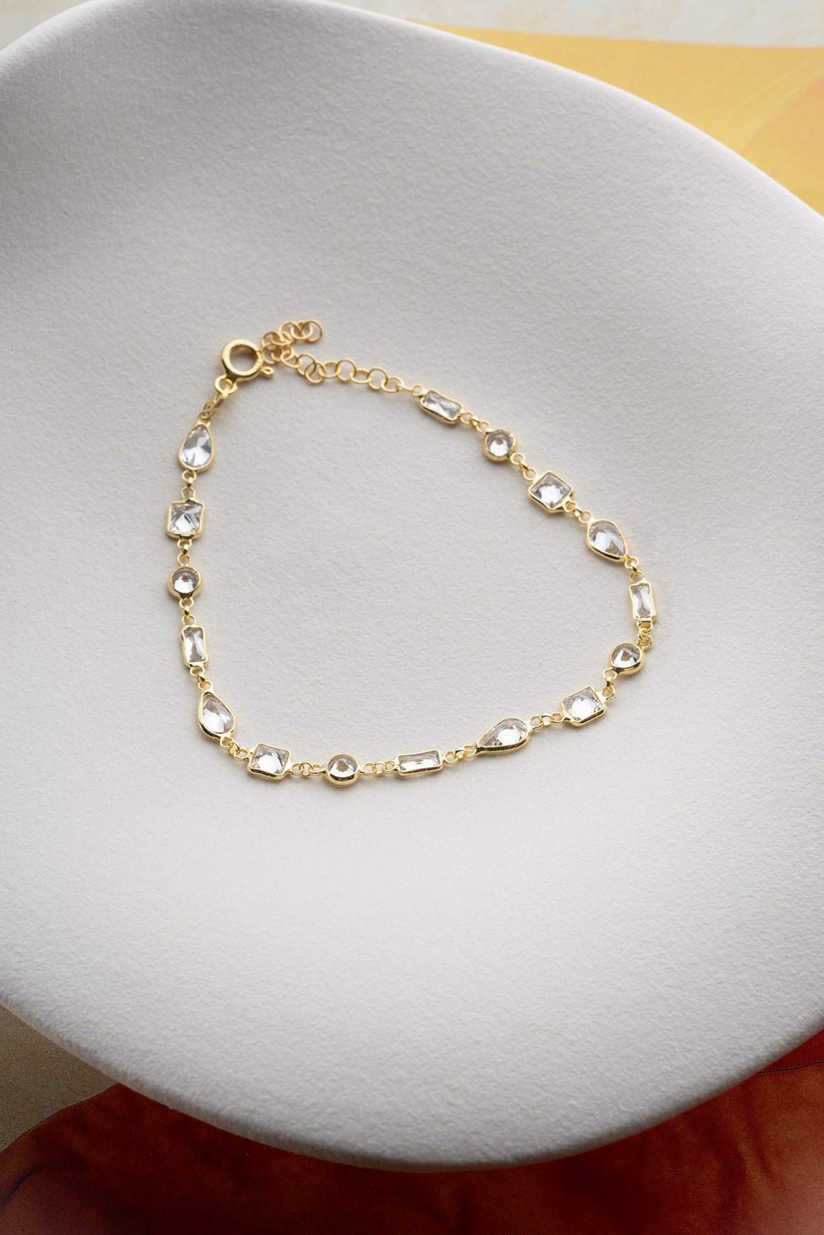 Elegant geometric stone detailed gold plated bracelet