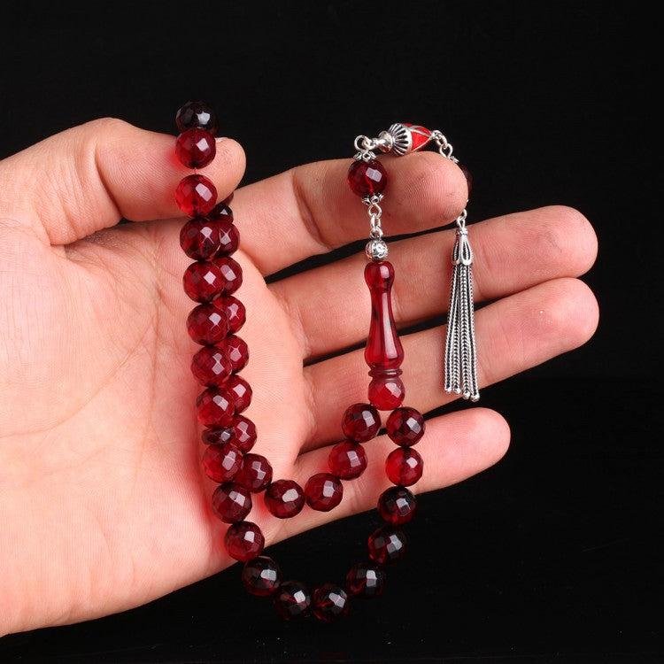 Red Facet Cut Drop Amber Rosary